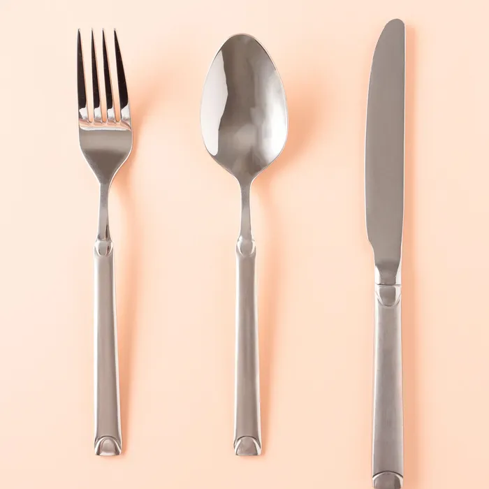 Brushed steel fork, spoon and knife
