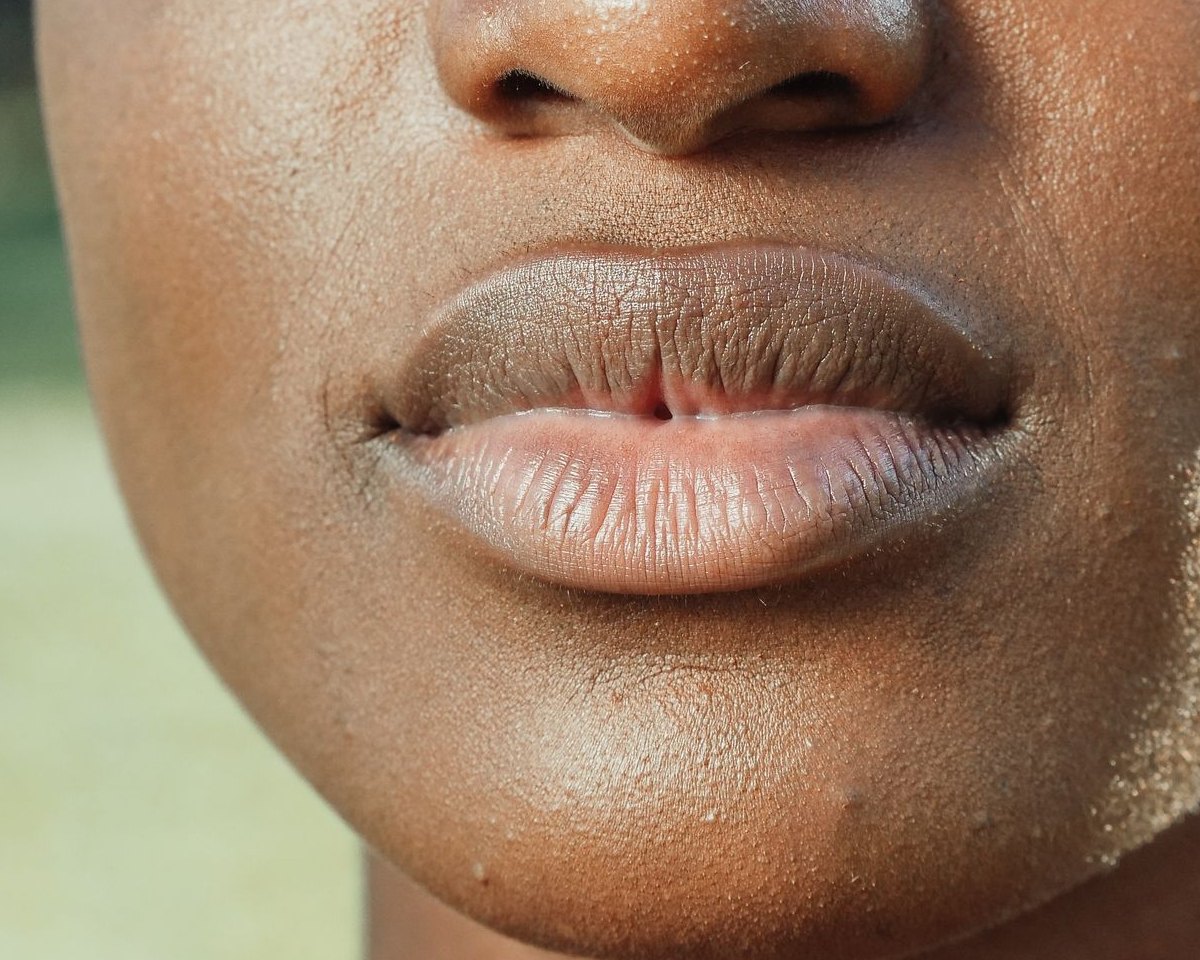 Full lips with an even, natural tone on deep skin