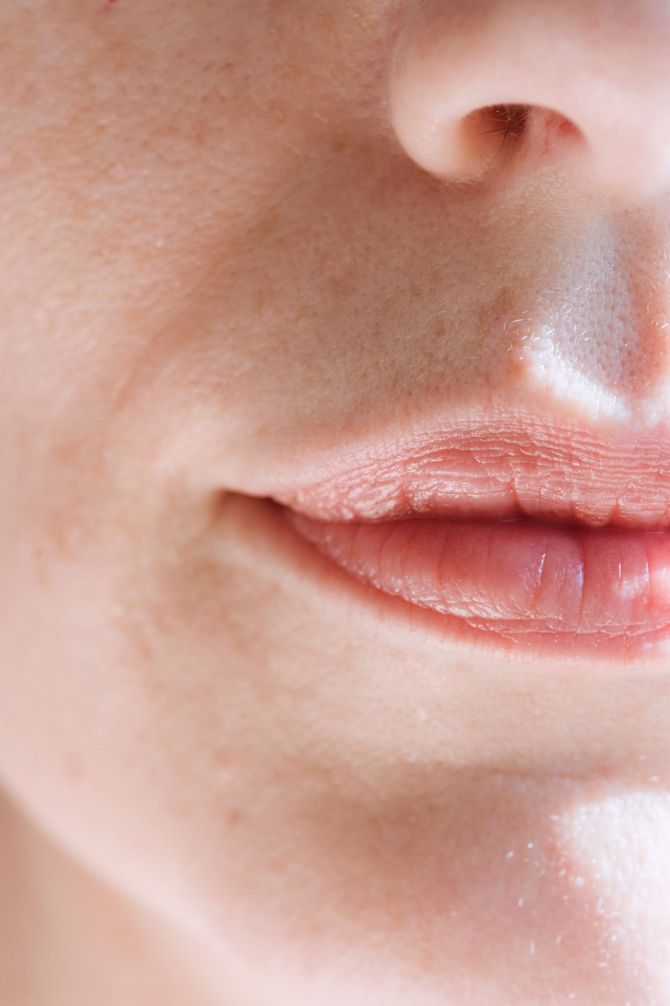 Soft peach lips in close-up